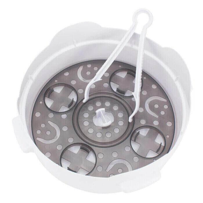 White plastic steamer basket with perforated base and handle for kitchen use