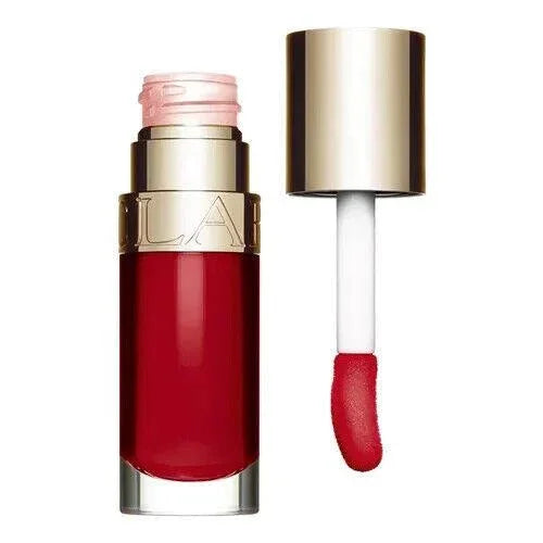 Red liquid lipstick with gold cap and applicator, vibrant glossy finish