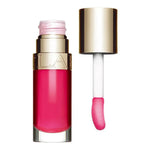 Pink lip gloss with gold cap and applicator, vibrant color for makeup