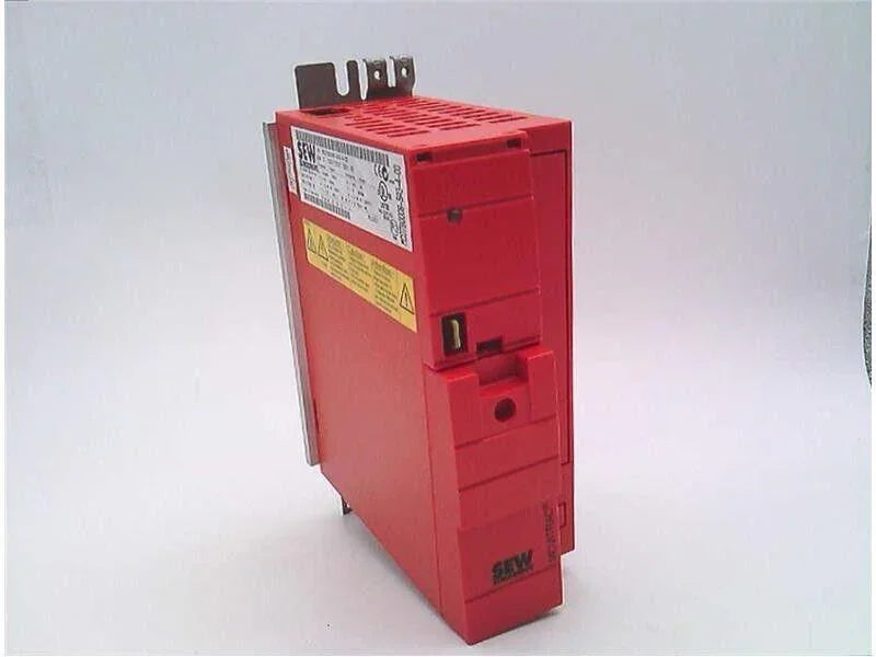 Red SEW industrial motor drive with warning labels and ventilation slots
