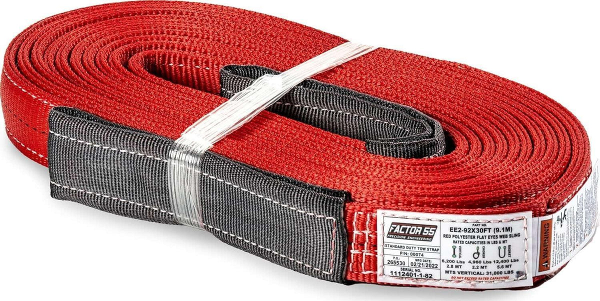 Red polyester flat eye web sling tow strap with black ends, labeled Factor 55 for heavy-duty towing
