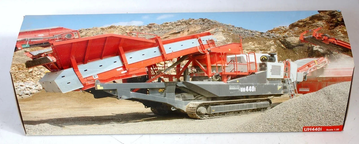 Sandvik UH440i mobile crusher on tracks, red and gray, mining site, scale 1:50 model