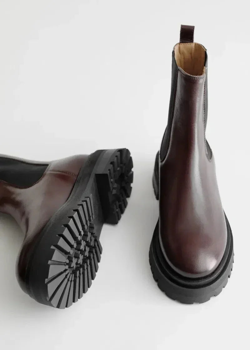Brown leather Chelsea boots with chunky black soles
