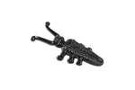 Black cast iron beetle-shaped hook for wall decor or utility use