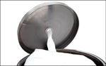 White plastic PVC roll table cover dispensing from black container, ideal for tablecloth use