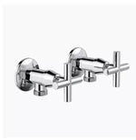 Chrome wall-mounted faucet with cross handles for bathroom or kitchen use
