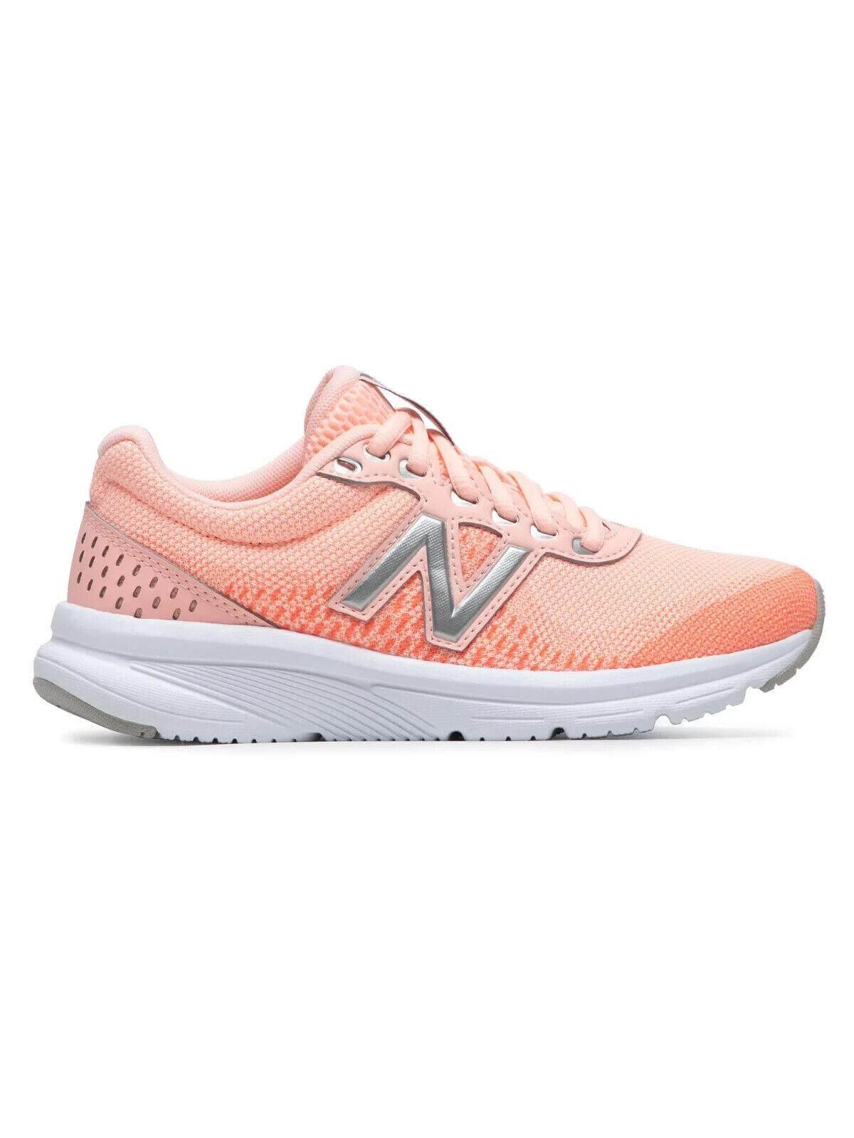 Pink New Balance running shoe with white sole and silver logo