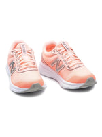 Pink New Balance 411 running shoes with white soles and silver accents