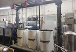 Fluxwrap industrial heating blankets on factory equipment, used for machinery maintenance and thermal processing
