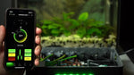 Smartphone app controlling aquarium pump, fan, lights, and heater with health status display
