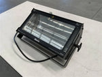 Martin brand industrial work light with protective cover, ideal for workshop or garage use