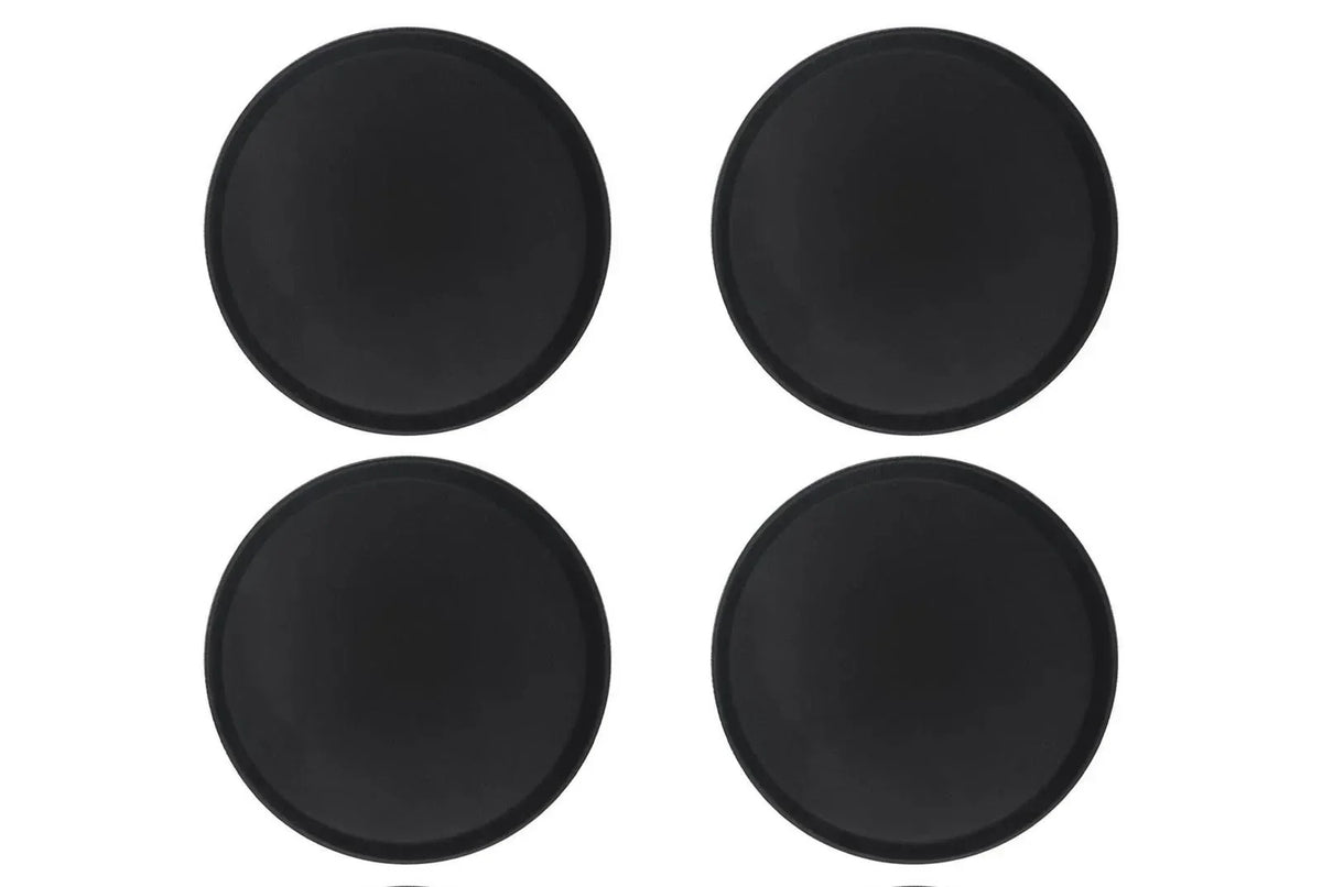 Four black circular tractor parts caps for AGCO or EATON equipment