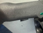 Cast iron tractor part with engraved part number and green dot, heavy-duty farm equipment component