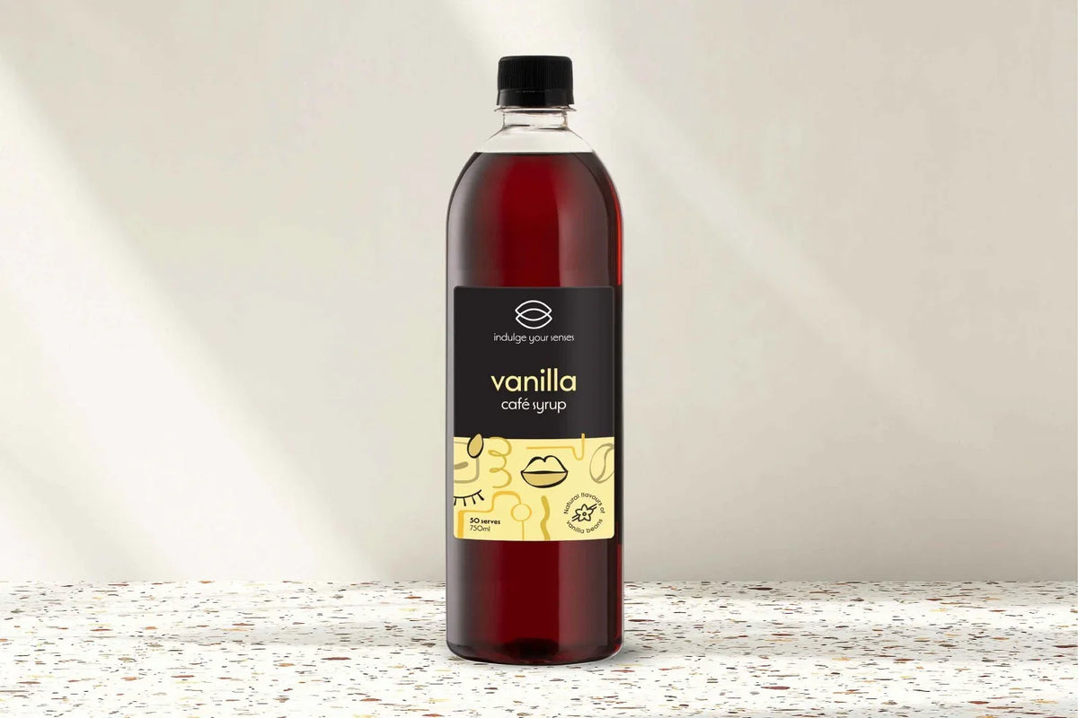Vanilla café syrup bottle, 750ml, natural flavor, 50 serves, on speckled countertop