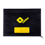 Black Vetter anti-fatigue mat with yellow logo, ideal for workshop or industrial use