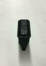 Black power take off switch for Navistar International trucks on white background