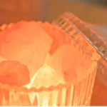 Orange plastic PVC roll table cover with textured pattern for durable tablecloth use