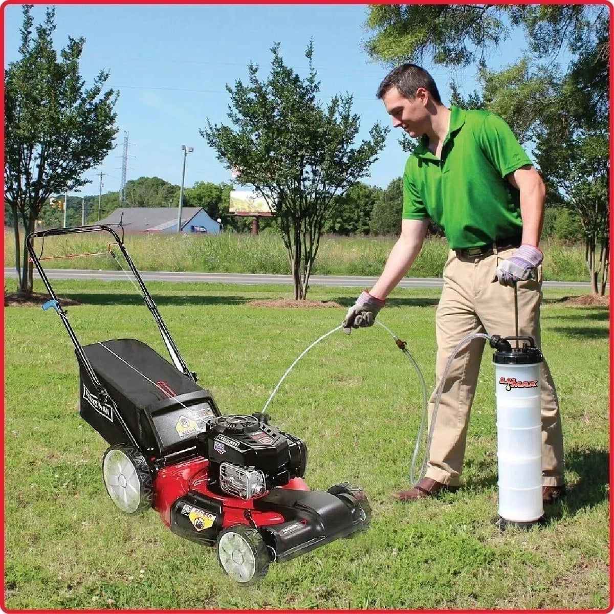 Man using spray sprayer on red lawn mower in grassy yard