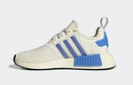 White sneaker with blue stripes and heel detail, stylish casual footwear