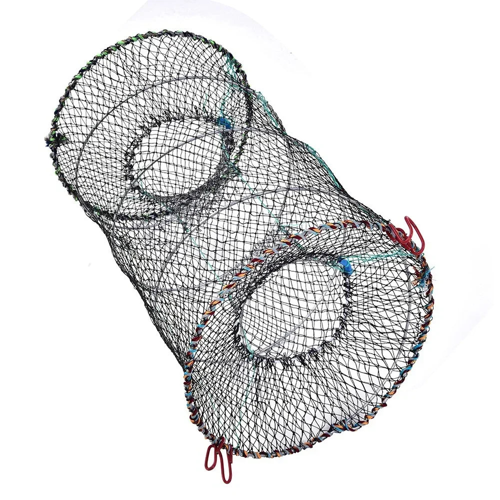 Black mesh fishing trap with colorful edges and red hooks for catching small aquatic creatures.