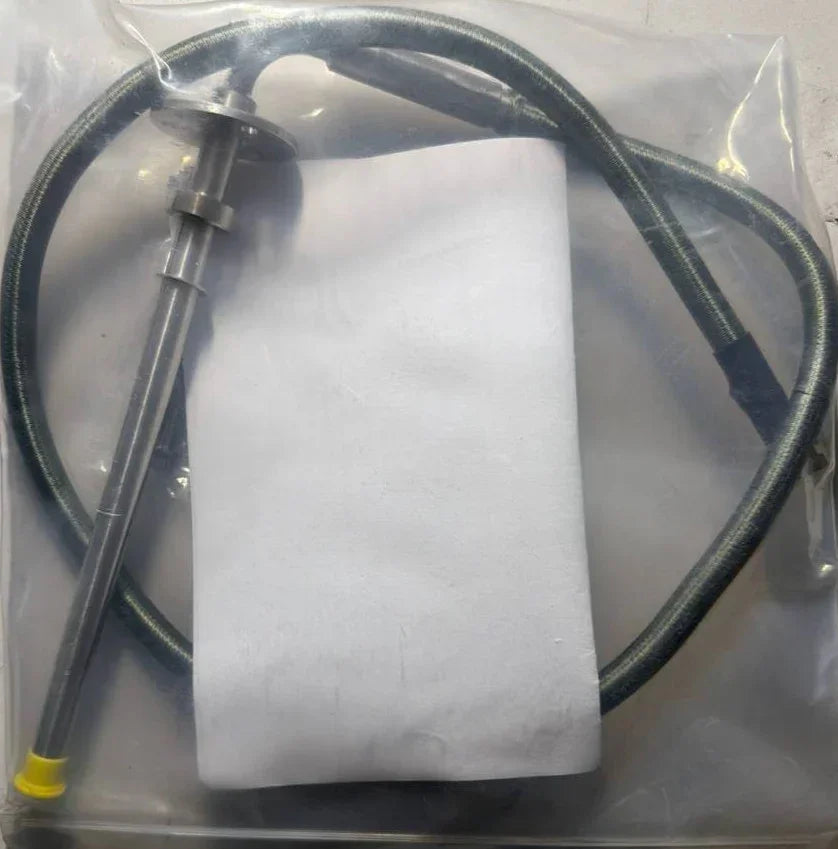 Tractor parts hose and metal rod in plastic packaging