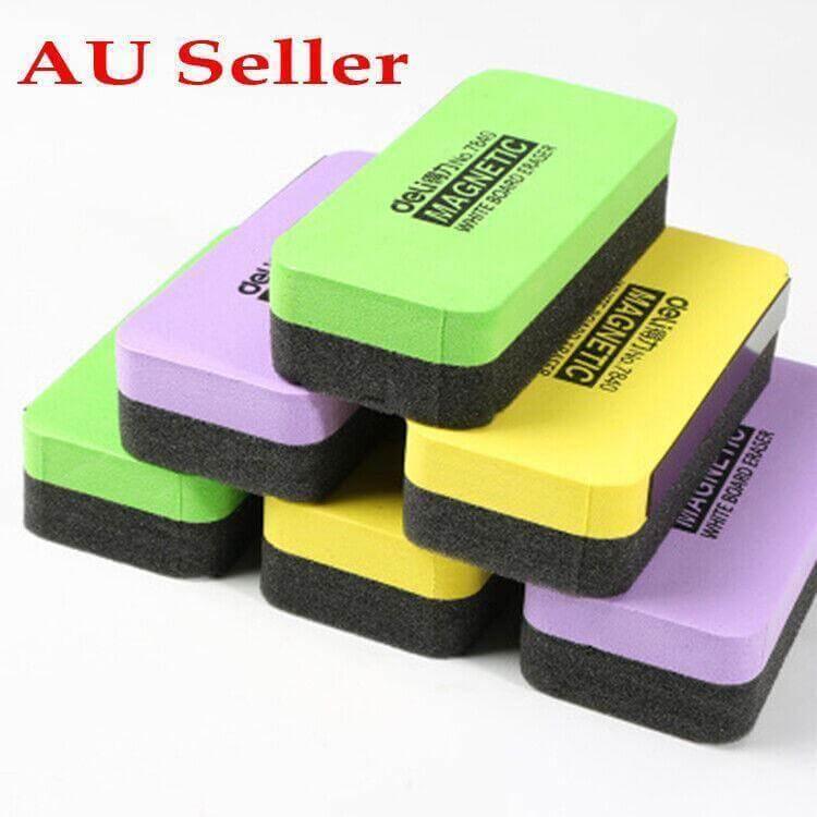 Colorful foam whiteboard eraser magnet attached to a metal surface for easy cleaning of drywipe and chalk marks