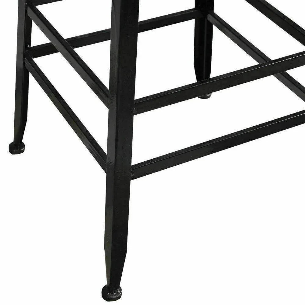 Close-up of black metal bar stool legs with cross-supports