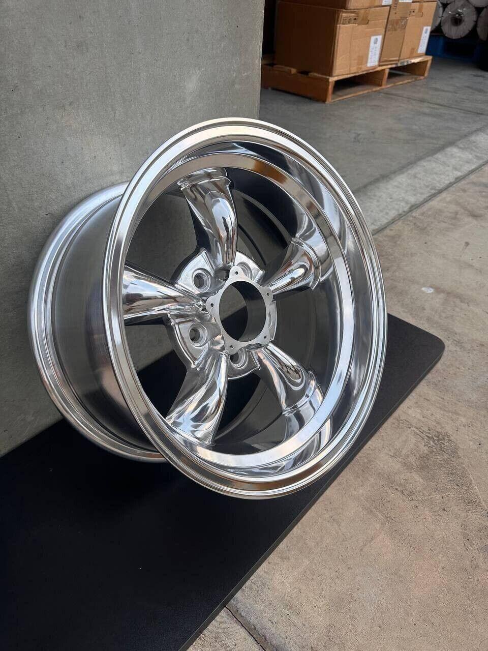 Shiny chrome alloy wheel with five-spoke design, ideal for trucks or heavy-duty vehicles