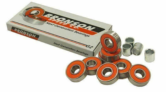 Set of eight orange-sealed ball bearings and spacers with box labeled Next Generation Bearings