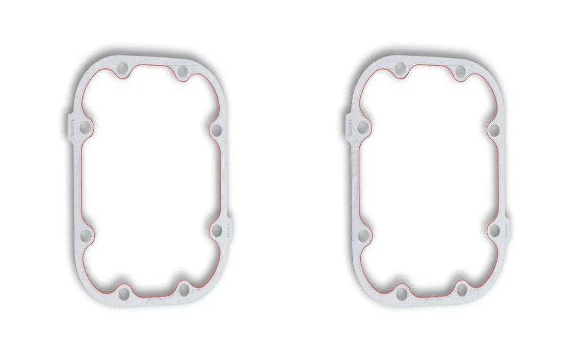 Pair of rectangular PTO cover gaskets with bolt holes for tractor parts on white background