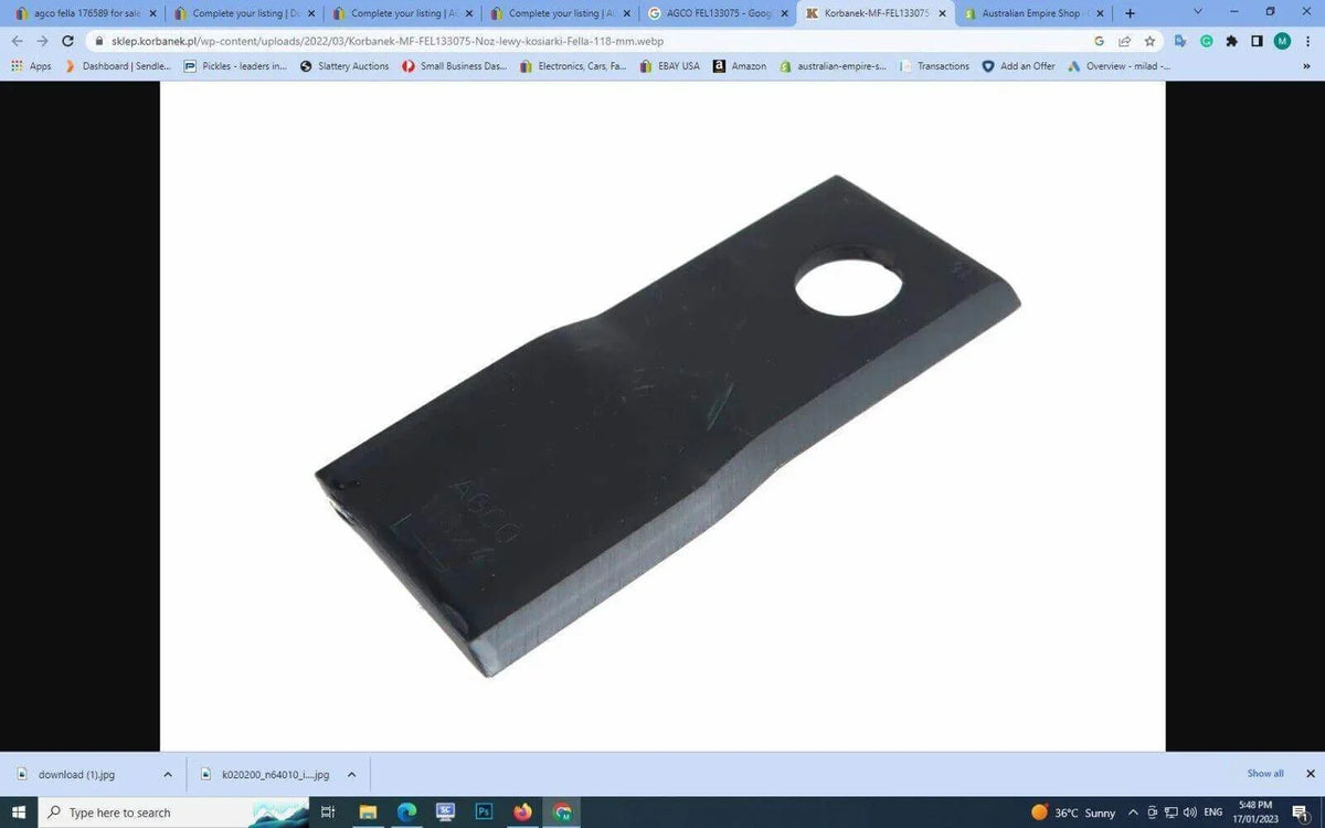 Metal mower knife blade with mounting hole, replacement part for tractor machinery