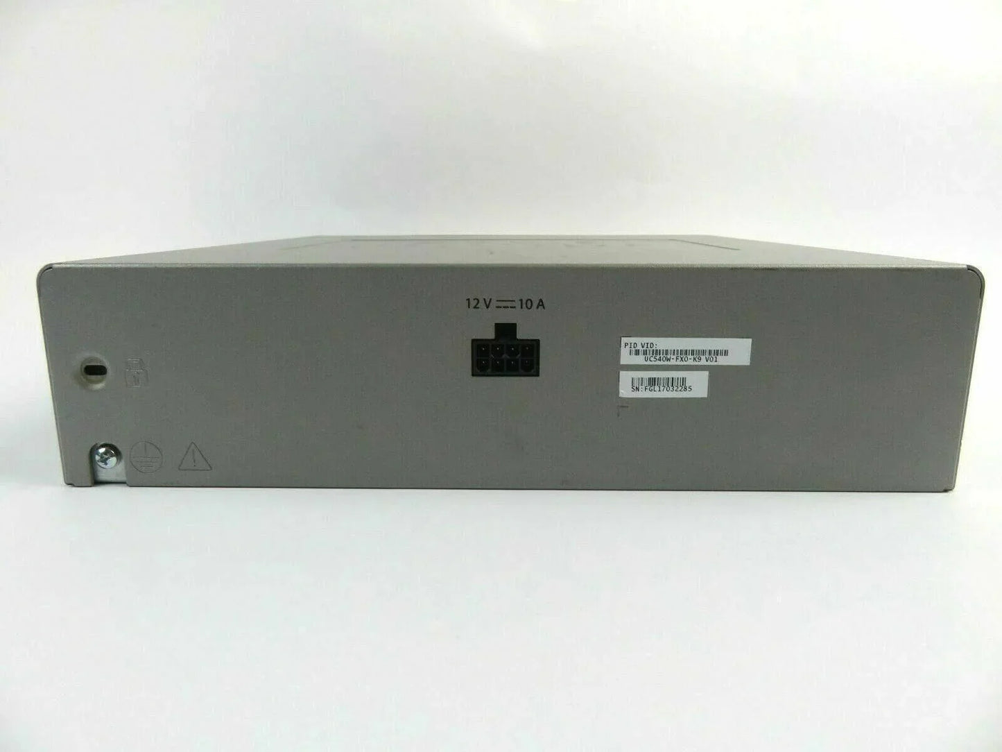 Back view of office phone system communication device with power port and labels