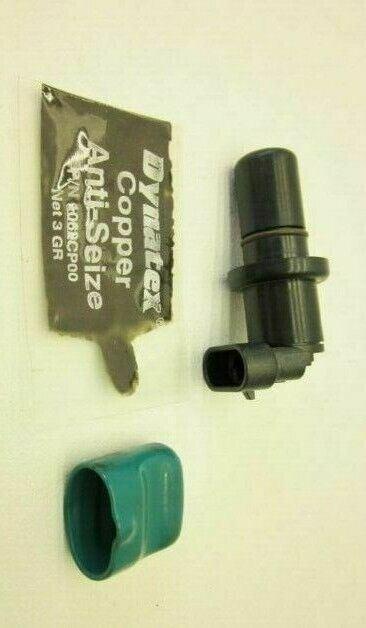 Eaton speed sensor kit with sensor, protective cap, and copper anti-seize packet on white background