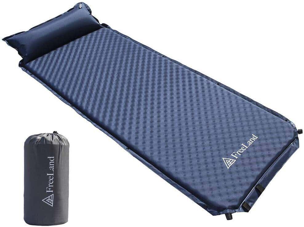 Blue self-inflating camping sleeping pad with attached pillow and carry bag