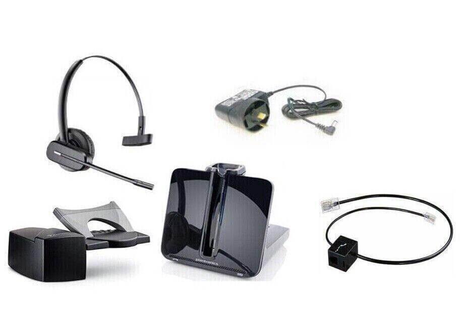 Wireless office headset with charging base, power adapter, and phone cable kit on white background