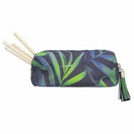 Leaf print portable makeup bag with zipper, tassel detail, and wooden makeup brushes inside