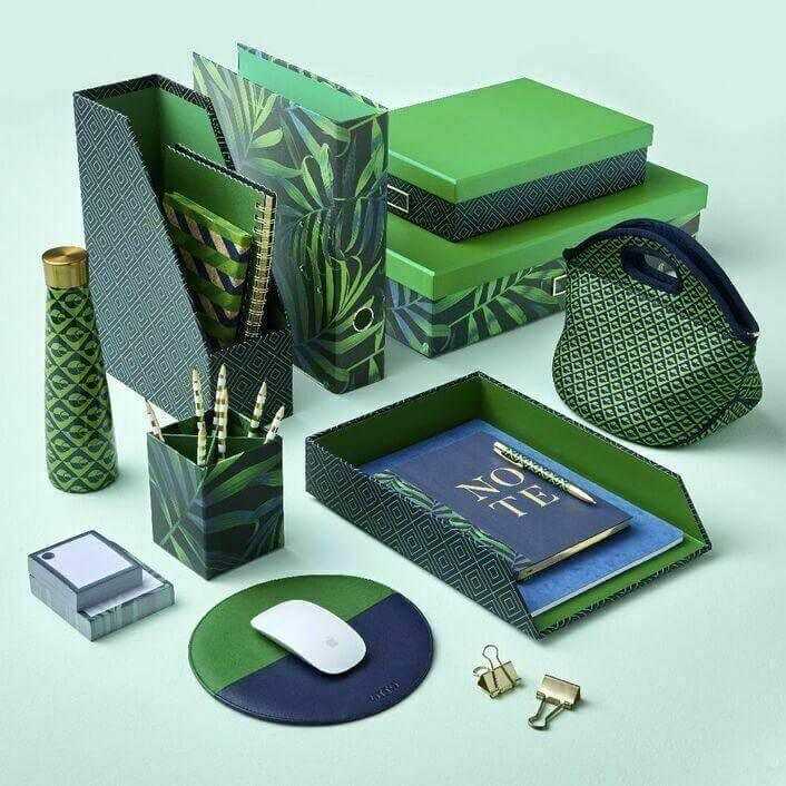 Green and blue patterned desk organizer set with folders, notebooks, pen holder, and mouse pad.
