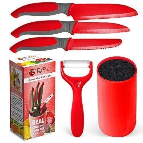Red kids knife set with three knives, vegetable peeler, knife holder, and packaging.