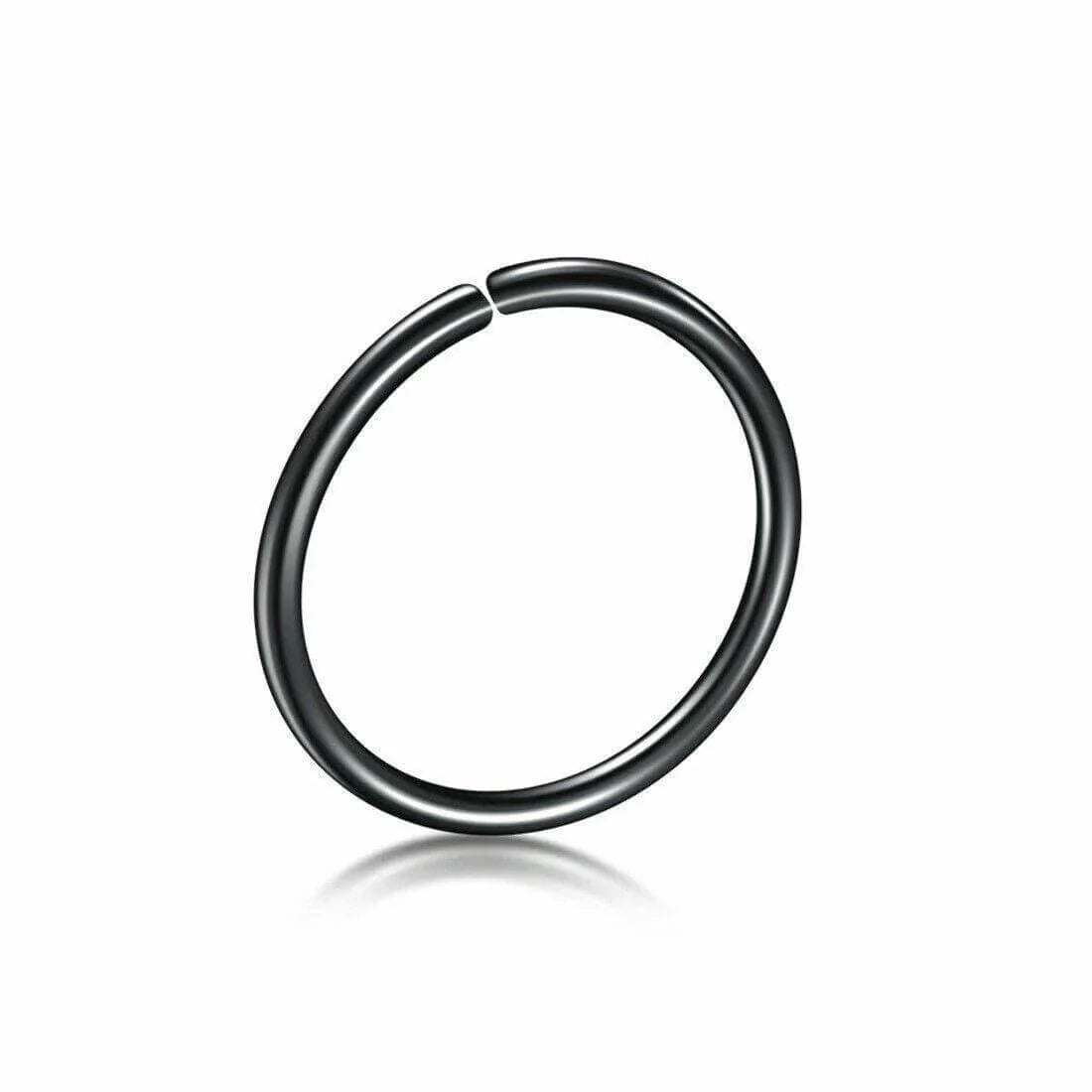 Black fake nose ring, minimalist circular body piercing jewelry on white background