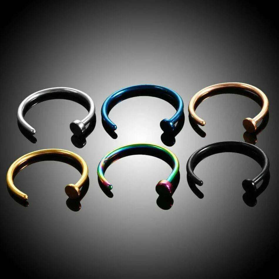 Set of six unisex fake nose rings in silver, gold, black, blue, rose gold, and rainbow colors