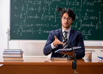 Man teaching math with flexible desk mount phone holder in classroom