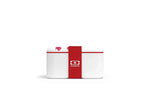Monbento white lunchbox with red strap and logo, sleek design for daily use