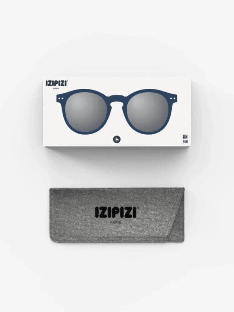 IZIPIZI Paris sunglasses in navy blue frame with silver lenses, displayed with branded case and packaging