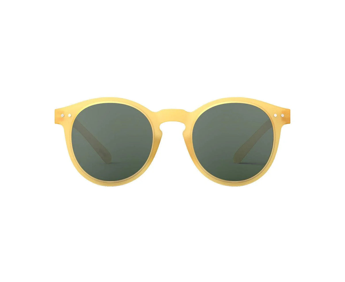Yellow-framed sunglasses with green lenses for outdoor style and sun protection