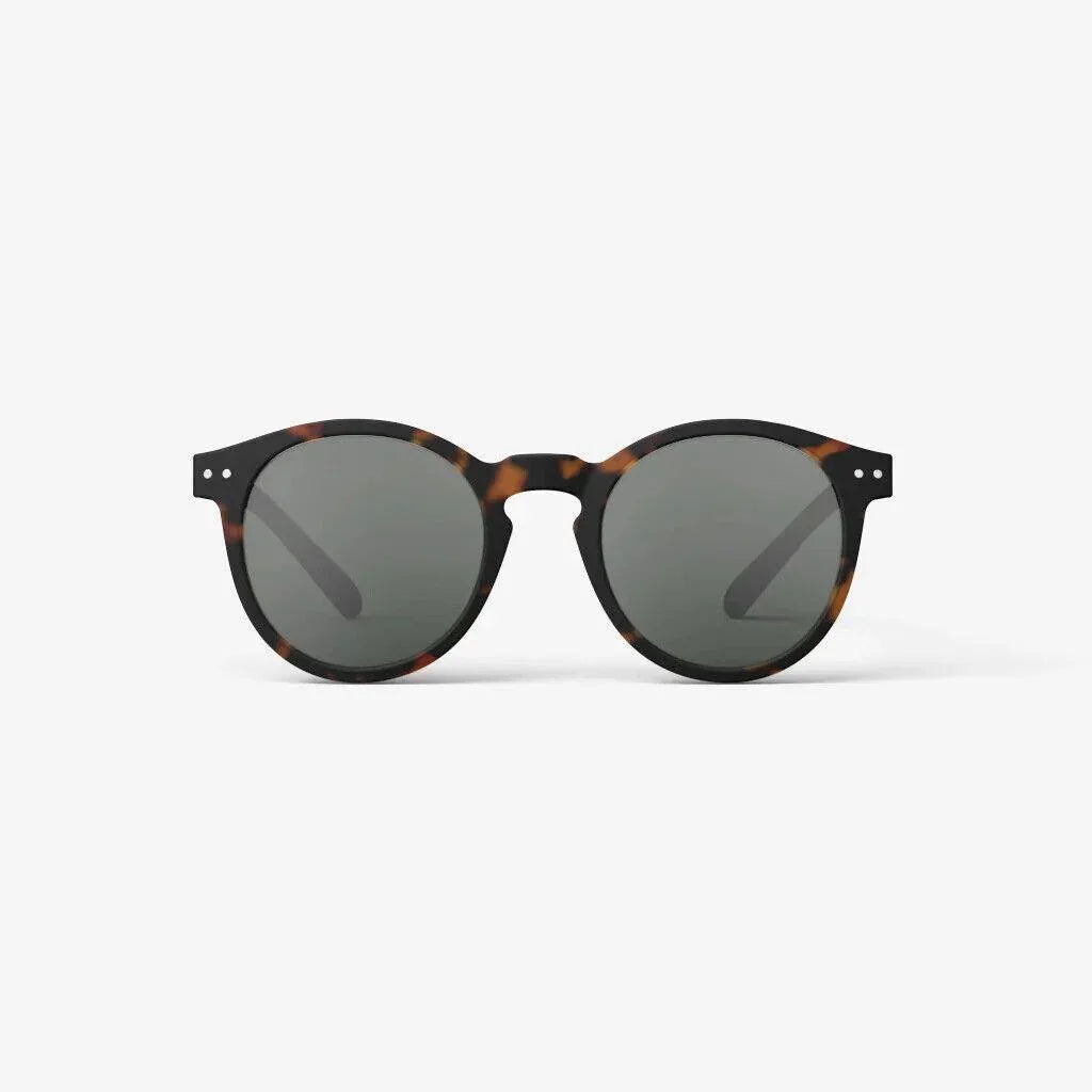 Tortoiseshell round sunglasses with dark lenses