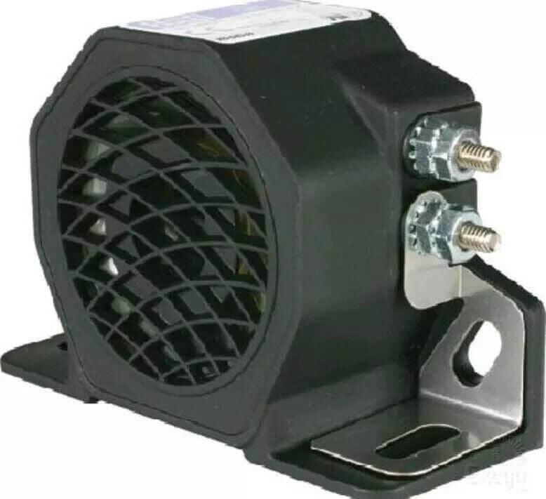 Black industrial alarm with metal mounting bracket and terminal screws