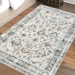 Vintage-style area rug with floral and geometric patterns on wooden floor