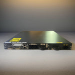 Black network switch with console and stack ports, ideal for office phone systems and IT infrastructure