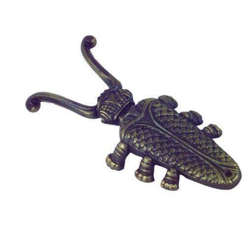 Antique-style beetle-shaped metal hook with textured wings and curved antennae