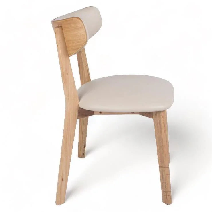 Modern wooden chair with beige upholstered seat and backrest, minimalist design for dining or office use